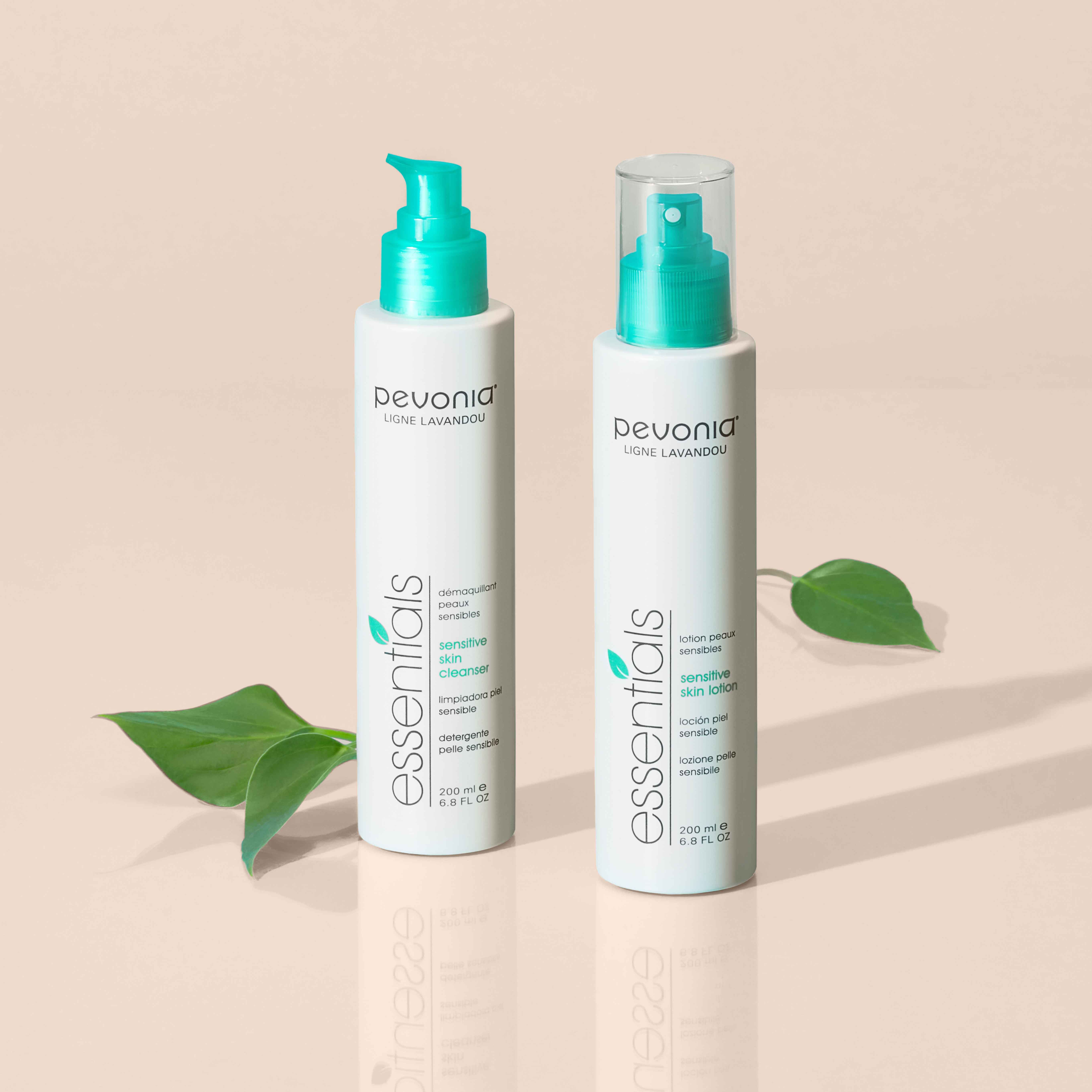 Sensitive Skin Cleanser and Lotion standing near leaves.