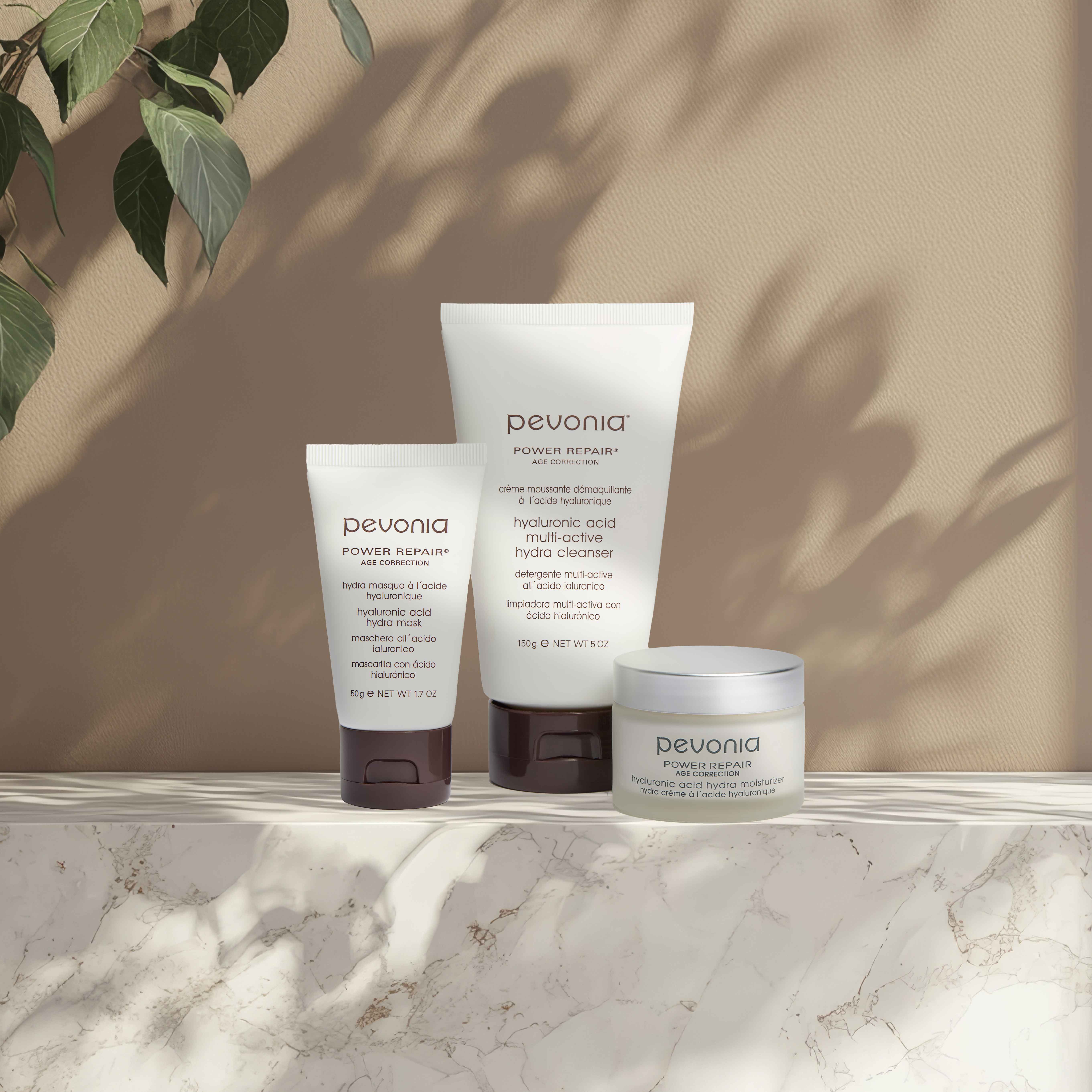 Hyaluronic Acid Products underneath leaf shadows.